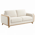 Divano in tessuto beige con struttura in legno massello